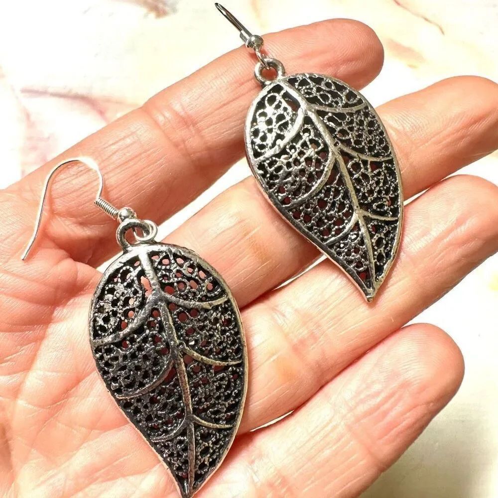 Silver tone leaf earrings